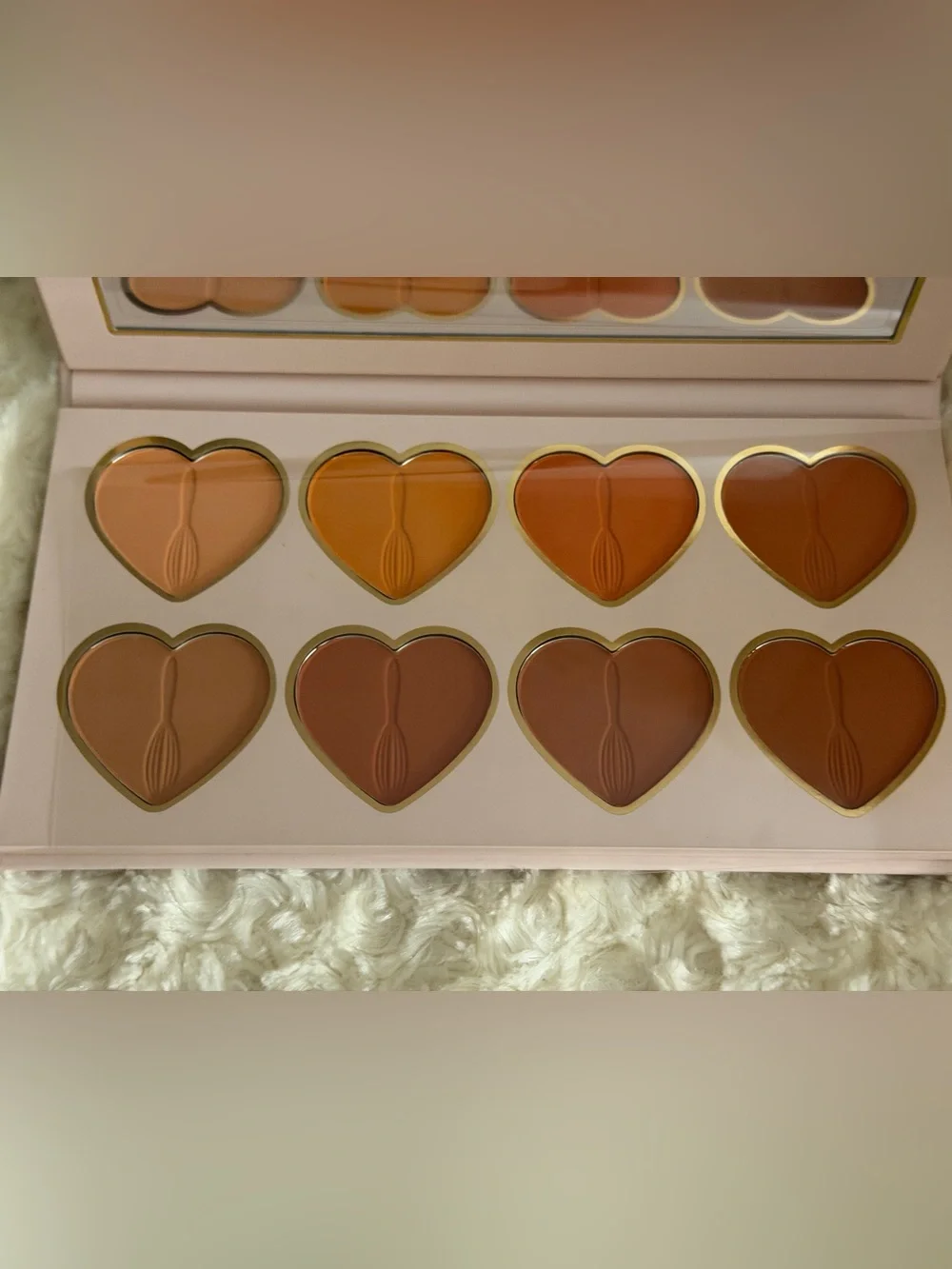 PLouise Bronzer, highlight, and contour Palettes